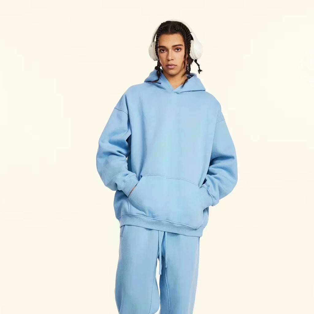 A men's casual hooded sweater with blessing cross design and geometric patterns in a regular fit suitable for spring and autumn