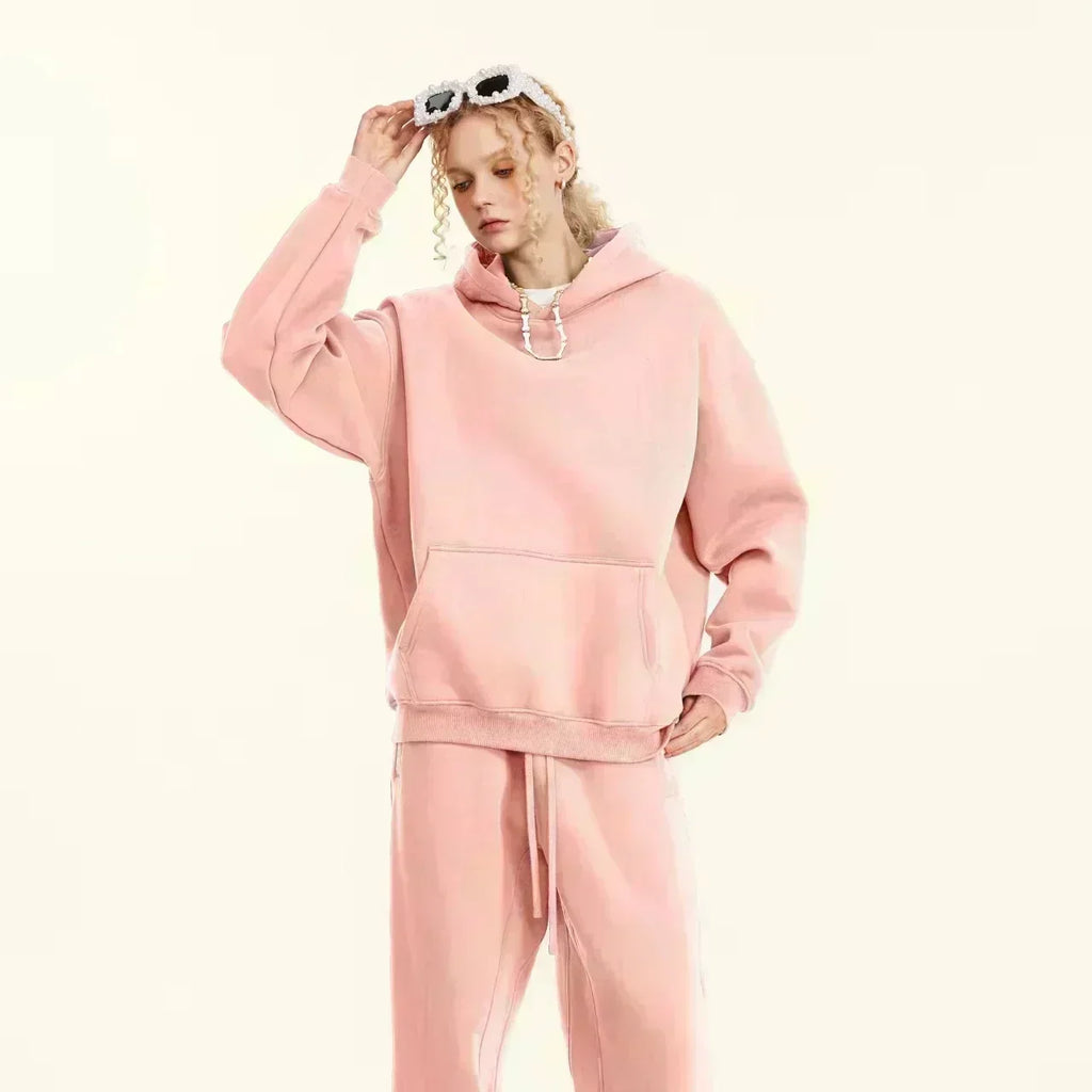 A men's casual hooded sweater with blessing cross design and geometric patterns in a regular fit suitable for spring and autumn